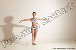 Swimsuit Gymnastic poses Woman White Moving poses Slim long brown Dynamic poses Academic